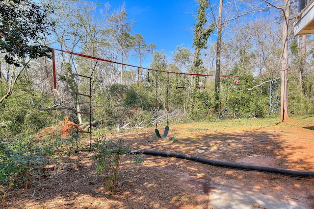 view of property's community with a view of trees