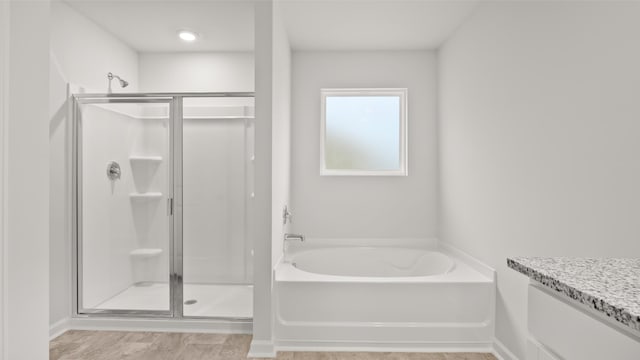 417 Kentbury Ct, Aiken, SC 29801 - full bath with a stall shower, a garden tub, vanity, and baseboards