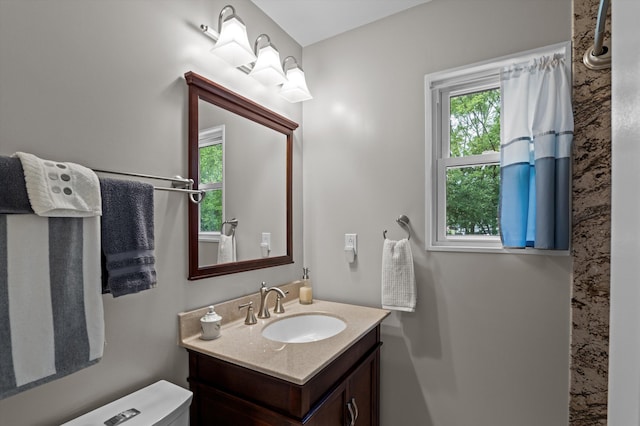 492 Pheasant Run Dr, Evans, GA 30809 - bathroom featuring plenty of natural light, vanity, and toilet