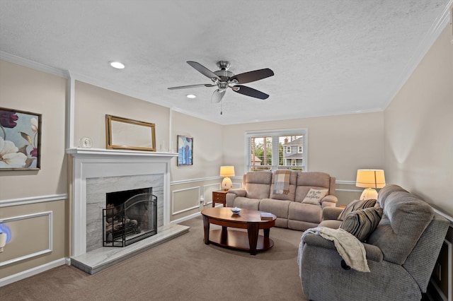492 Pheasant Run Dr, Evans, GA 30809 - living room featuring carpet, ceiling fan, a high end fireplace, recessed lighting, and crown molding