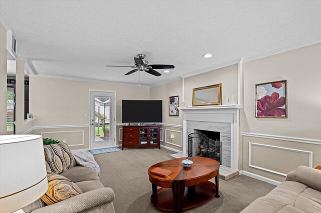 492 Pheasant Run Dr, Evans, GA 30809 - living area featuring carpet, a decorative wall, ornamental molding, a premium fireplace, and ceiling fan