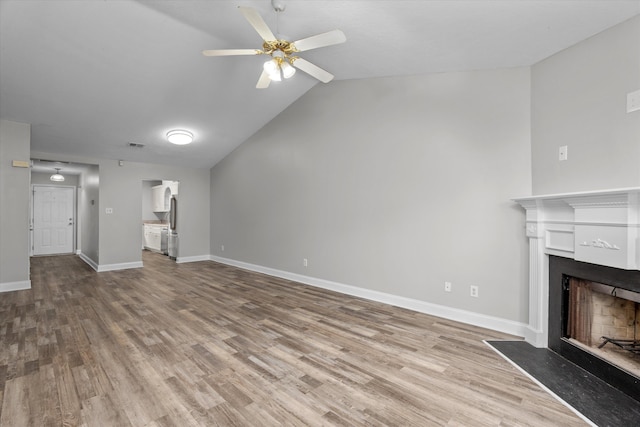 55 Charlestowne Dr, Augusta, GA 30907 - unfurnished living room with a ceiling fan, wood finished floors, a fireplace, and lofted ceiling