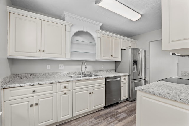 55 Charlestowne Dr, Augusta, GA 30907 - kitchen with stainless steel appliances, wood finished floors, and white cabinets