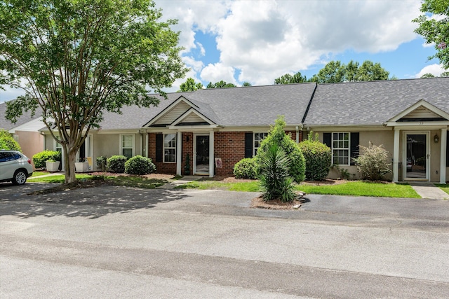 55 Charlestowne Dr, Augusta, GA 30907 - view of front of house featuring a shingled roof, brick siding, and stucco siding