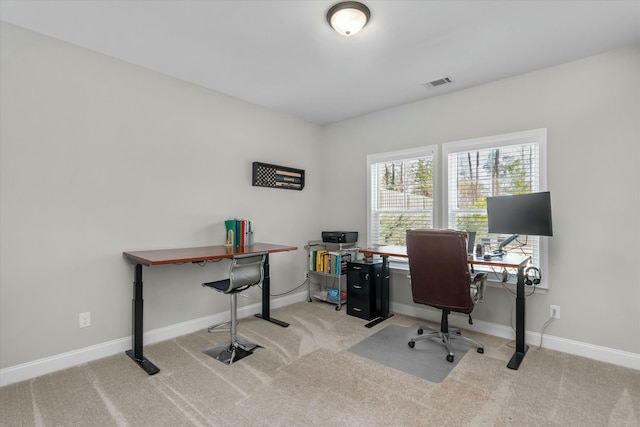 office area featuring carpet floors, visible vents, and baseboards