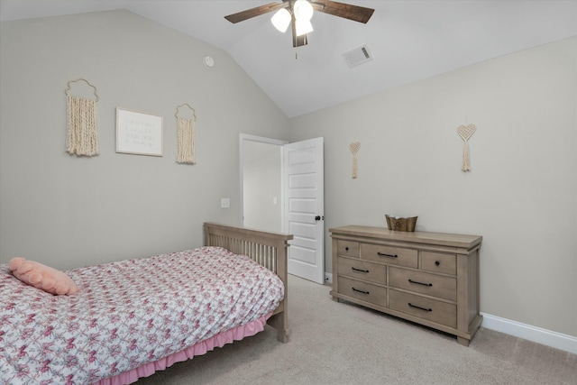 bedroom with ceiling fan, light colored carpet, visible vents, baseboards, and vaulted ceiling