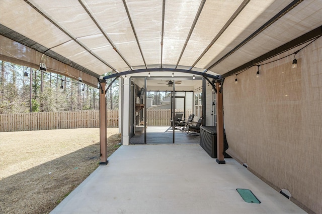 view of patio / terrace featuring fence