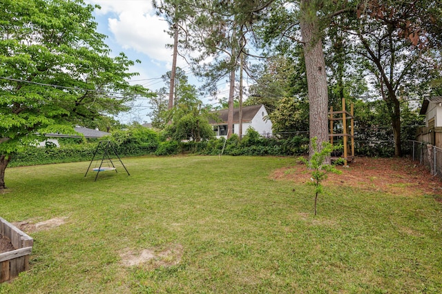 view of yard featuring a fenced backyard
