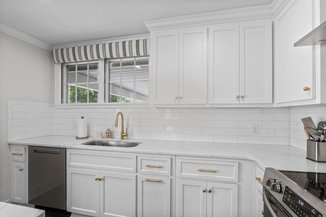 kitchen with appliances with stainless steel finishes, a sink, white cabinetry, backsplash, and ornamental molding
