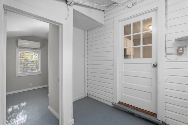 property entrance with a wall mounted air conditioner