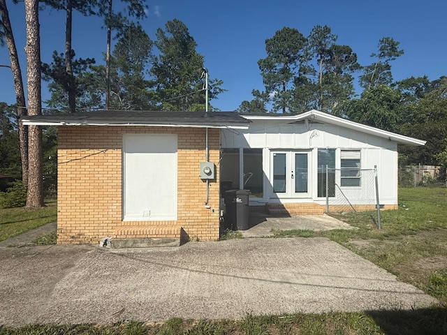 3314 Forest Estates Dr, Augusta, GA 30909 - view of front facade featuring french doors, entry steps, and brick siding
