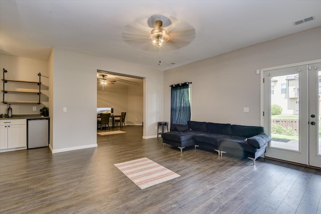 336 Shell Brooke Way, Lexington, SC 29073 - living area featuring a ceiling fan, dark wood-style floors, bar, french doors, and baseboards