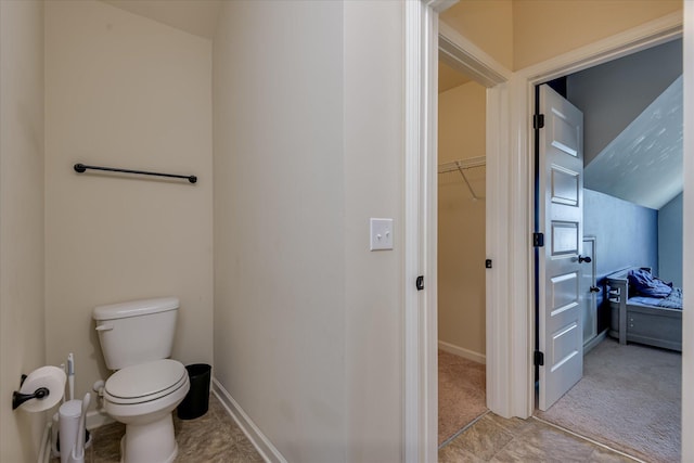 336 Shell Brooke Way, Lexington, SC 29073 - bathroom with toilet, a walk in closet, and baseboards