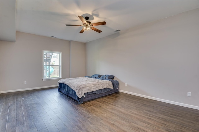 336 Shell Brooke Way, Lexington, SC 29073 - bedroom with baseboards, dark wood finished floors, and ceiling fan