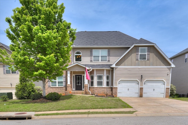 336 Shell Brooke Way, Lexington, SC 29073 - craftsman-style house featuring brick siding, driveway, an attached garage, a front lawn, and board and batten siding