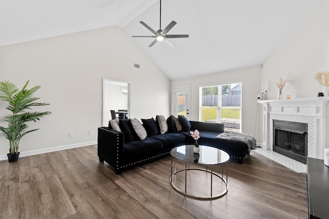 3235 Warwick Pl, Hephzibah, GA 30815 - living room featuring high vaulted ceiling, ceiling fan, wood finished floors, and a tile fireplace