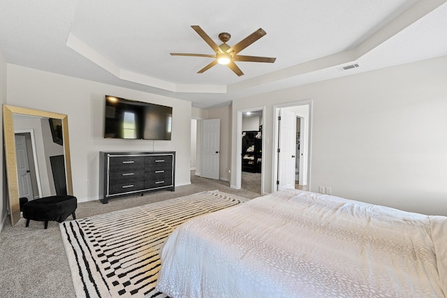 3235 Warwick Pl, Hephzibah, GA 30815 - bedroom featuring carpet flooring, a tray ceiling, and ceiling fan