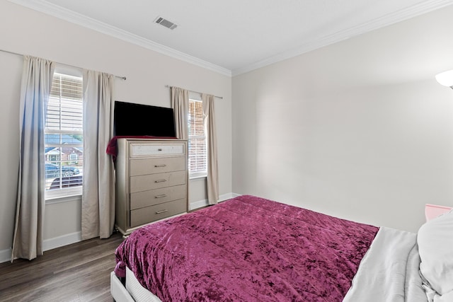 3235 Warwick Pl, Hephzibah, GA 30815 - bedroom with ornamental molding and wood finished floors