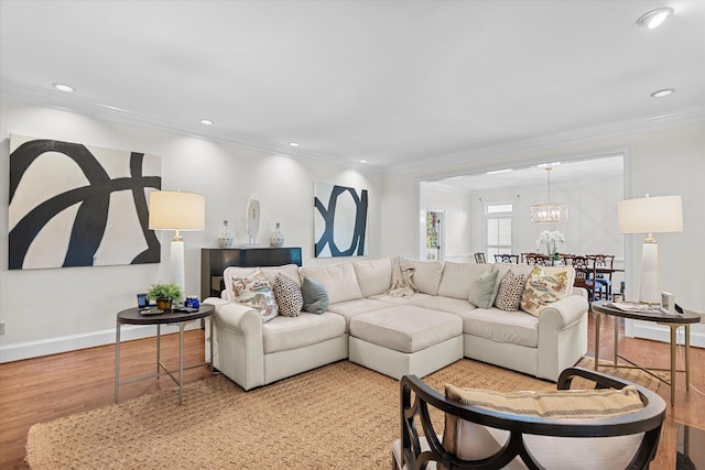 2801 Peachtree Pl, Augusta, GA 30909 - living room featuring wood finished floors, crown molding, a chandelier, baseboards, and recessed lighting