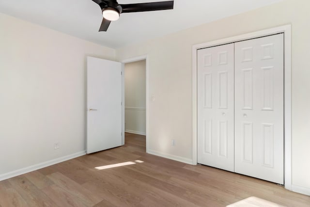 unfurnished bedroom featuring a closet, ceiling fan, and light hardwood / wood-style floors