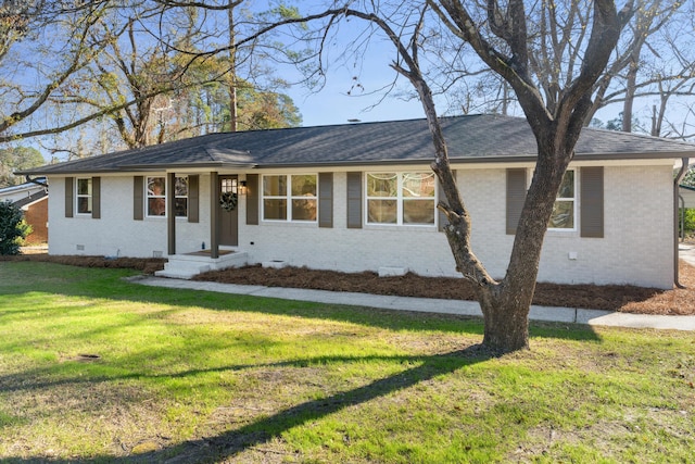 ranch-style house with a front yard