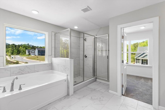 823 Elsie Dr, North Augusta, SC 29860 - bathroom featuring a garden tub, a shower stall, marble finish floors, plenty of natural light, and recessed lighting