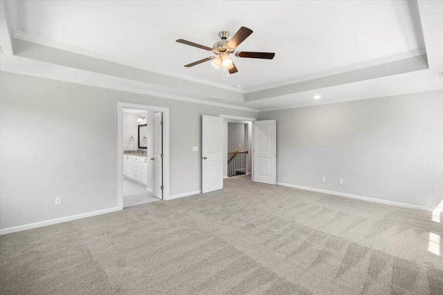 823 Elsie Dr, North Augusta, SC 29860 - unfurnished bedroom with a raised ceiling, ornamental molding, carpet flooring, ensuite bath, and a ceiling fan