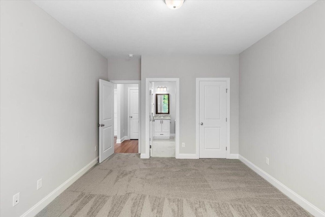 823 Elsie Dr, North Augusta, SC 29860 - unfurnished bedroom featuring carpet floors and connected bathroom