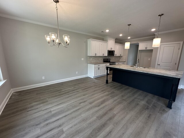 unfurnished living room featuring baseboards, coffered ceiling, ornamental molding, a fireplace, and beam ceiling