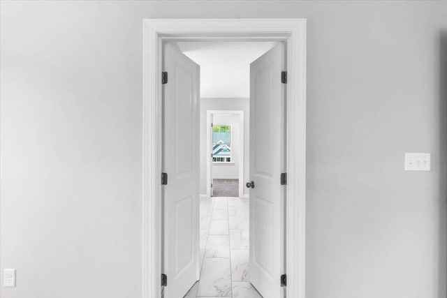 823 Elsie Dr, North Augusta, SC 29860 - corridor featuring light marble finish flooring and baseboards