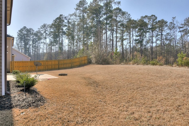 view of yard with fence