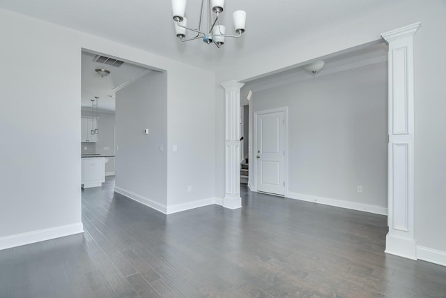 interior space with visible vents, crown molding, dark wood-type flooring, baseboards, and decorative columns