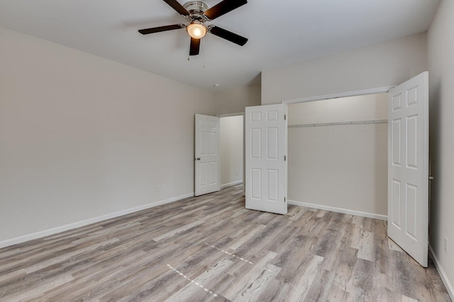 unfurnished bedroom with ceiling fan, light wood finished floors, a closet, and baseboards