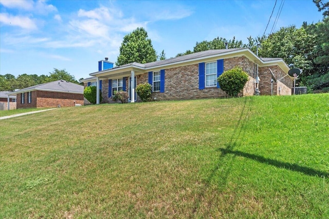 3346 Saddlebrook Dr, Hephzibah, GA 30815 - ranch-style home with brick siding, a front yard, and a chimney