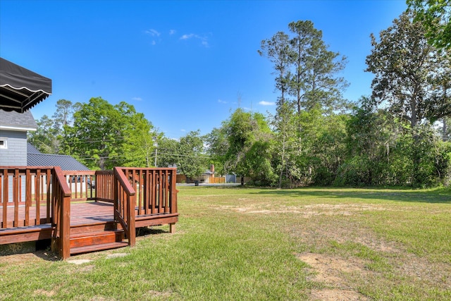 view of yard with a wooden deck