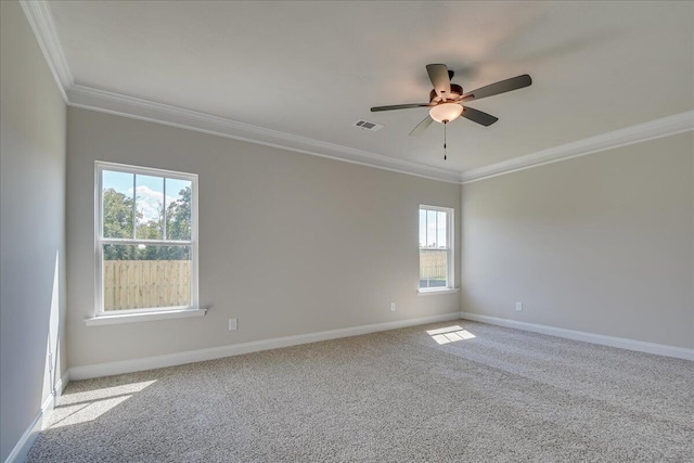 carpeted empty room with ornamental molding and ceiling fan