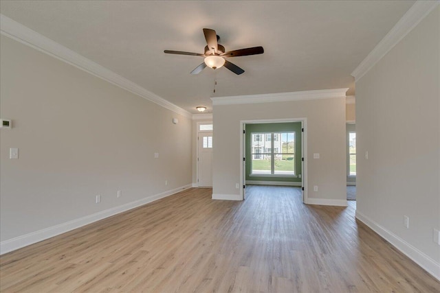 unfurnished living room featuring ornamental molding, light wood-type flooring, and ceiling fan