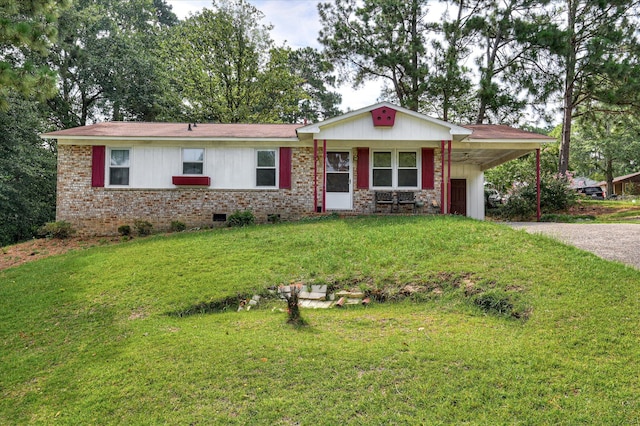 3115 Arcadia Dr, Augusta, GA 30906 - ranch-style home featuring gravel driveway, an attached carport, a front yard, brick siding, and crawl space