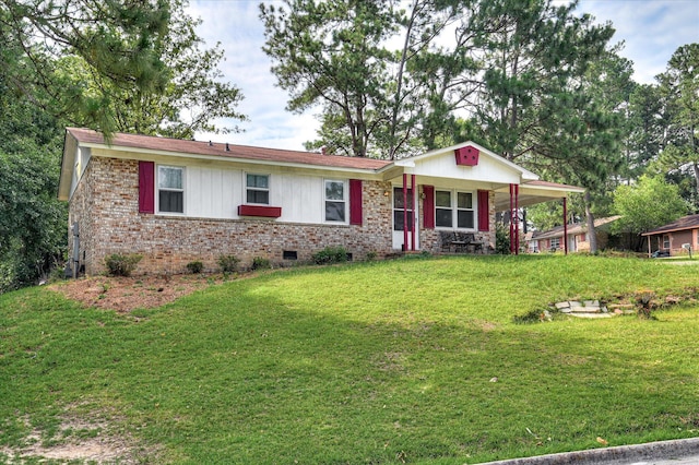 3115 Arcadia Dr, Augusta, GA 30906 - ranch-style house featuring crawl space, a front lawn, a porch, and brick siding