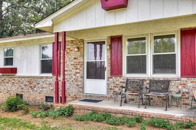 3115 Arcadia Dr, Augusta, GA 30906 - entrance to property featuring brick siding, crawl space, and covered porch