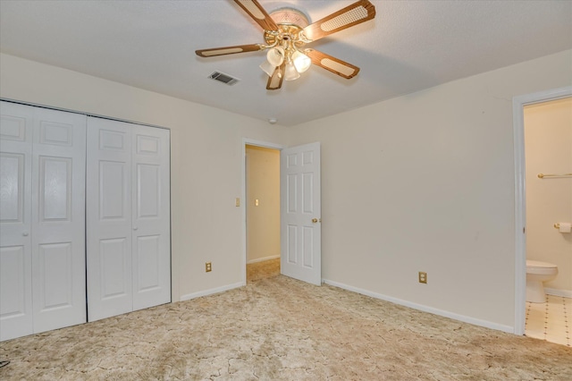 3115 Arcadia Dr, Augusta, GA 30906 - unfurnished bedroom with carpet, a closet, ensuite bath, and a ceiling fan