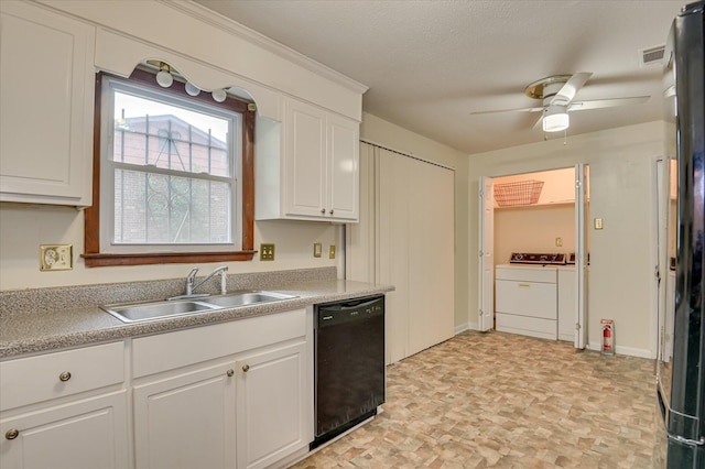 3115 Arcadia Dr, Augusta, GA 30906 - kitchen with black dishwasher, washing machine and clothes dryer, white cabinets, a ceiling fan, and light countertops