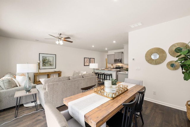 living room featuring ceiling fan and light wood-type flooring