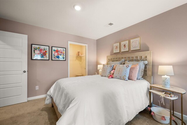 bedroom with light carpet