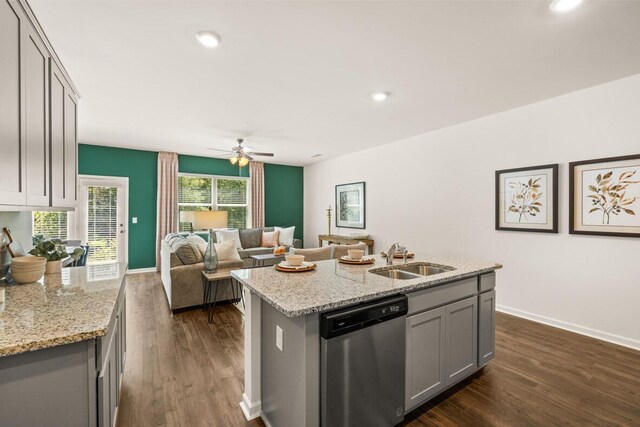 kitchen with dishwasher, a center island with sink, sink, dark hardwood / wood-style floors, and gray cabinets