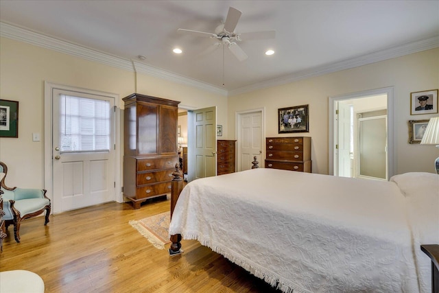 bedroom with crown molding, ceiling fan, and light hardwood / wood-style floors