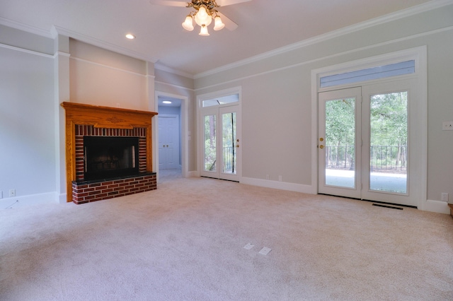 902 Patriots Pt, Mccormick, SC 29835 - unfurnished living room featuring ornamental molding, healthy amount of natural light, a fireplace, carpet, and ceiling fan