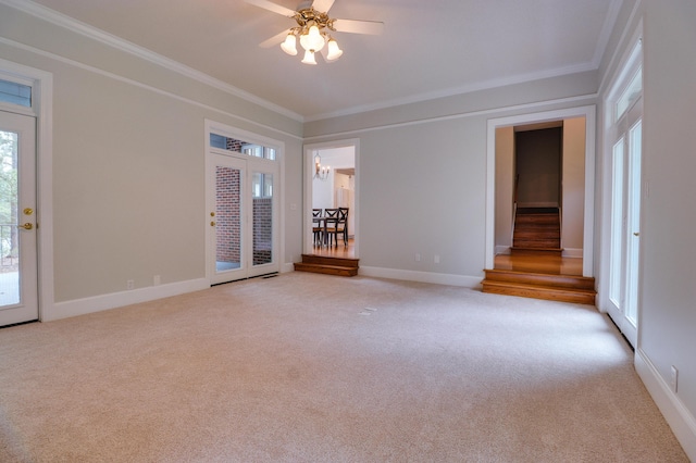 902 Patriots Pt, Mccormick, SC 29835 - carpeted spare room with ornamental molding, stairway, ceiling fan, and baseboards