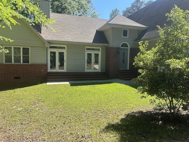 902 Patriots Pt, Mccormick, SC 29835 - rear view of property featuring entry steps, brick siding, a yard, and a chimney