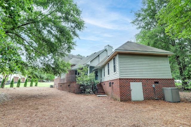 902 Patriots Pt, Mccormick, SC 29835 - view of side of home with brick siding, central AC unit, and crawl space